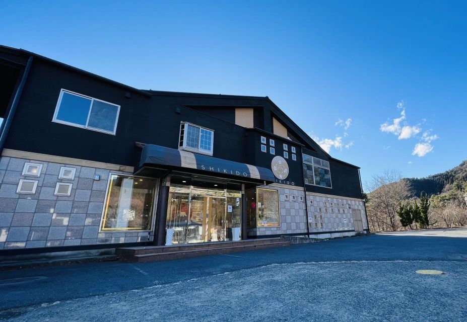 From Tokyo: Mt.Fuji, Tea Ceremony & Outlet Shopping Day Tour - Kinohananoyu onsen option: relax with Fuji if you swap shopping