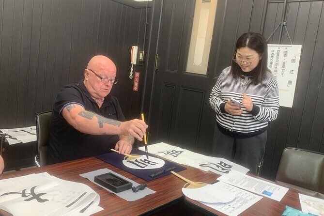 Japanese Calligraphy Class in Yokohama with Tea and Sweets - Picking your kanji (or your name character) and writing with the brush