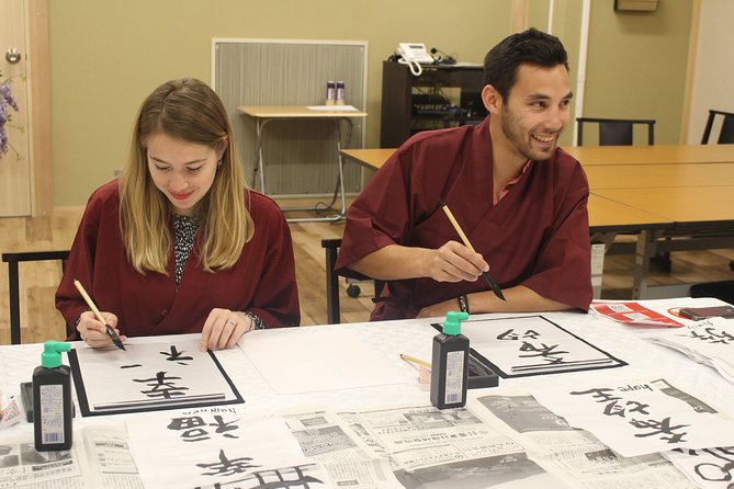 Japanese Calligraphy Experience - Tokyo calligraphy workshop setup at Kikai Shinkō Kaikan