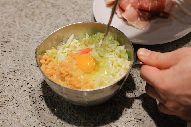 Okonomiyaki making experience~Japanese popular food - Meat vs Seafood: Choosing Your Okonomiyaki Style