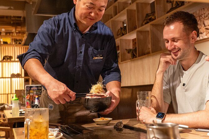 Private Bar Hopping Tour in Shinjuku Golden Gai - First Golden Gai bar: a guitarist owner and a music-focused interior