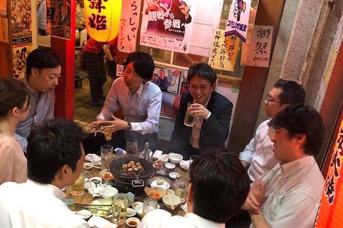 Private Tokyo Food Tour - Retro Akabane Izakaya Experience - The first izakaya stop: a raucous standing bar and bar-snack energy
