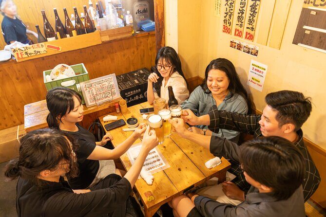 Shinjuku Underground Nightlife Tour: Izakaya Food & Bar Hopping - Kabukicho main gate and Godzilla Road: Quick orientation, big Tokyo energy