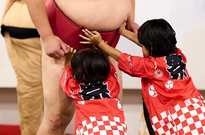 【SUMO FESTIVAL】Tokyo Ginza: Sumo Show & Photo Experience - Food in the background: welcome drink, sumo-themed options, and extras