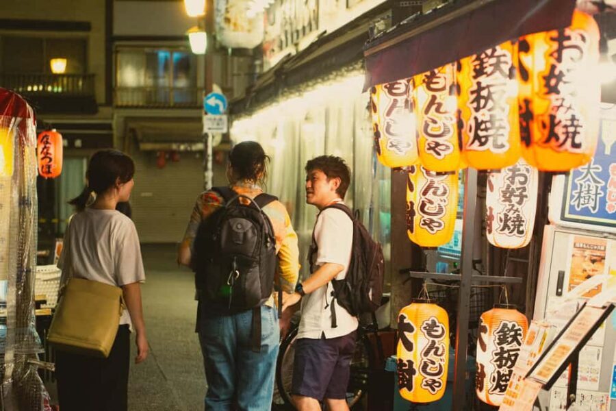 Tokyo: Asakusa Photogenic Night Walk with 1 drink - From temple calm to Hoppy Street nightlife energy