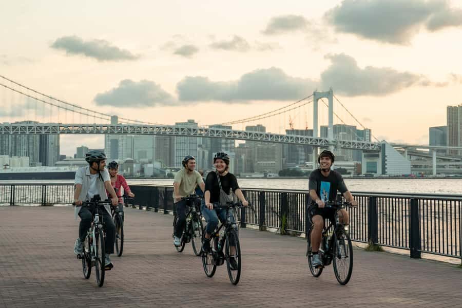 Tokyo Bay Area: Sunset Night View 3h E-bike Guided Bike Tour - Snack Stops: Conbini Pickups Plus a Traditional Japanese Bite