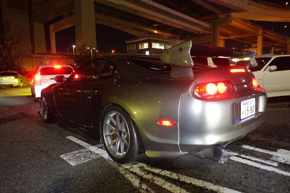 Tokyo: Daikoku Car Meet Tour at Night with JDM Guides - Runner Routes, Rainbow Bridge, and Tokyo Tower Without the Sightseeing Hassle