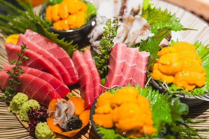 Tokyo Ginza Authentic Food Tour (Izakaya Hopping by local guide) - Ginza Mitsukoshi: A Quick Picture Moment at the Central Crossing