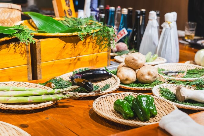 Tokyo Ginza Authentic Food Tour (Izakaya Hopping by local guide) - Stop 1 in Yurakucho: Fresh Seafood Linked to Tsukiji and Sake That Travels