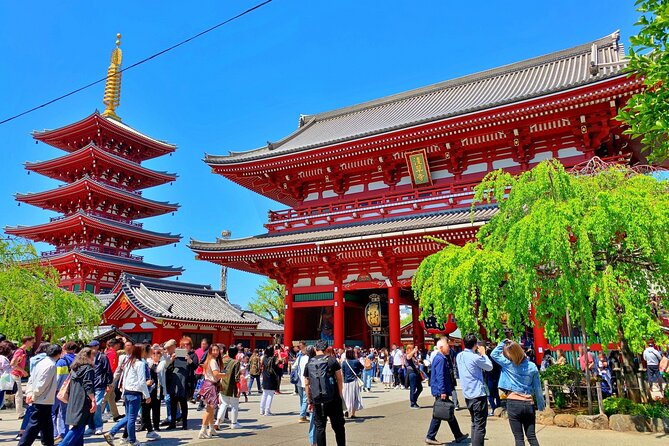 Tokyo Hidden Shrine and Temple Tour - Toyokawa Inari: fox statues and the Buddhism-Shinto mix