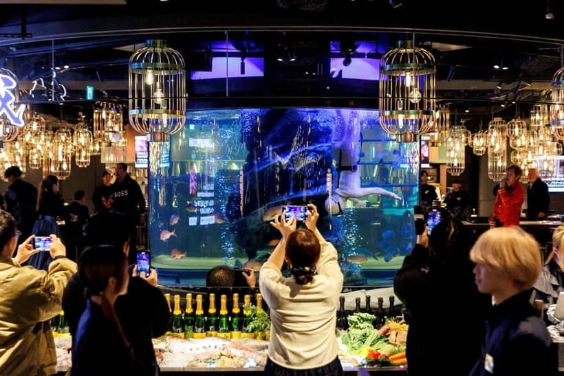 Tokyo: Japanese Experiece Dinner with Diving Ama Performance - Finding Grandhammer B1F Near Shimbashi Station