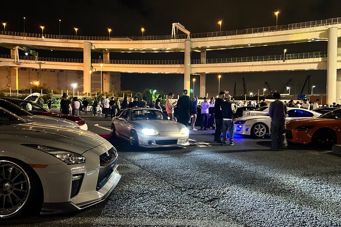 Tokyo JDM Car Meet Experience in Daikoku PA - Tokyo Tower at night: the city sight between car conversations