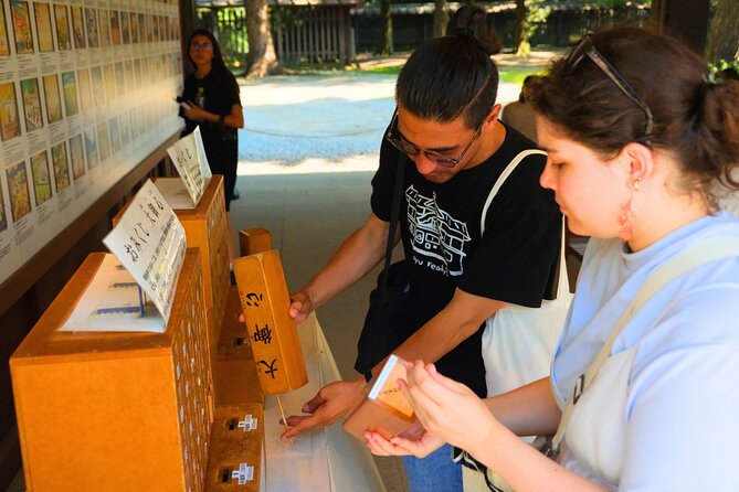 Tokyo Meiji Shrine & Harajuku: Walk Through Japanese Culture - Meiji Shrine Imperial Garden rituals: Purification, prayers, and omikuji