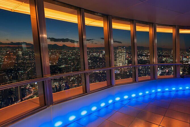 Tokyo Night E-Bike Tour with Tokyo Tower and Dolphin Show - Azabujuban Snack and Drink Break: Where Local Feel Meets Your Own Pace
