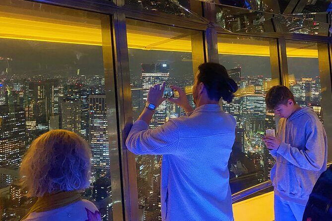 Tokyo Night E-Bike Tour with Tokyo Tower and Dolphin Show - Tokyo Tower Top Deck Tour: The 360° Night Finale