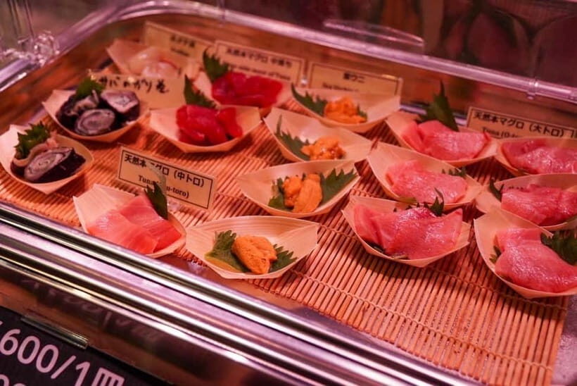 Tokyo: Private Tsukiji Street Food & Sake with Local Guide - Tsukiji Hongwan-ji: the temple stop that breaks Kyoto rules