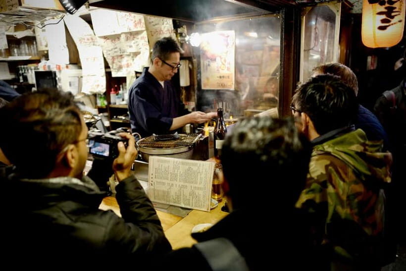 Tokyo: Shinjuku Izakaya Food&Drinking Tour (Local Guide) - Kabukicho Neon Walk and the Godzilla Statue Moment