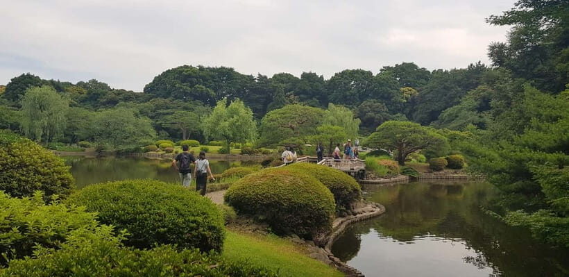 Tokyo Walk through: Shinjuku, Harajuku, Omotesando & Shibuya - Shinjuku streets and the train-city mindset (plus a garden breather)