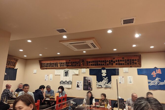 Tsugaru shamisen performance over traditional dinner - Senso-ji Temple: the stop that grounds the whole night
