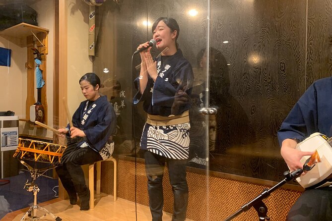 Tsugaru shamisen performance over traditional dinner - Kaminarimon and Nakamise: where the story becomes street life