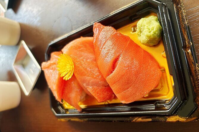 Tsukiji Food Strolling and Hama Rikyu Garden Walking Tour - Stop 1: Tsukiji Hongwanji Temple for a quick calm reset