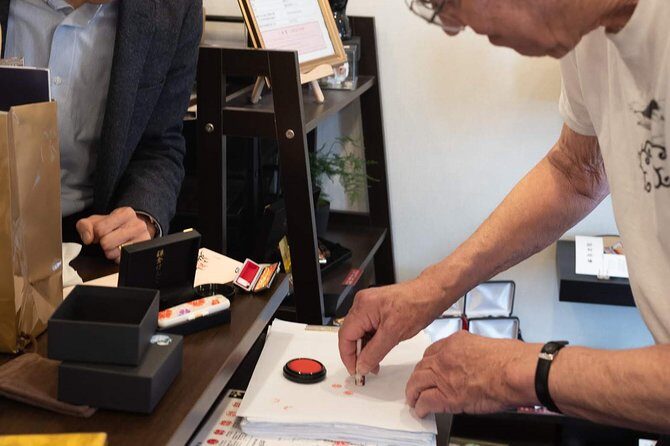 Your Own HANKO Name Seal Activity in Kamakura. - The engraving process: machine rough cut, craftsman finishing